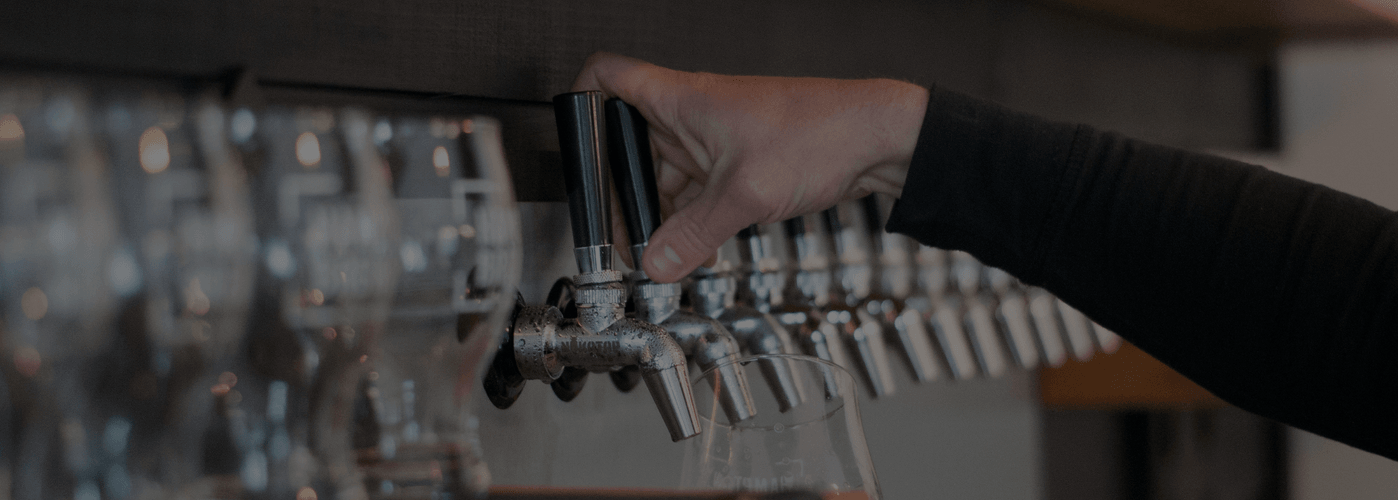 Background image of Hampton Brewing's taproom